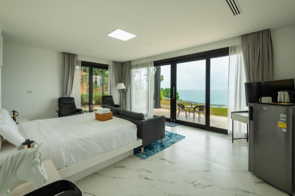 Postel nebo postele na pokoji v ubytování Bluemango Pool Villa & Resort Koh Samui