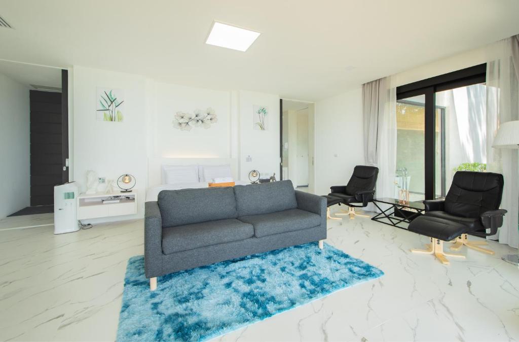Posezení v ubytování Bluemango Pool Villa & Resort Koh Samui