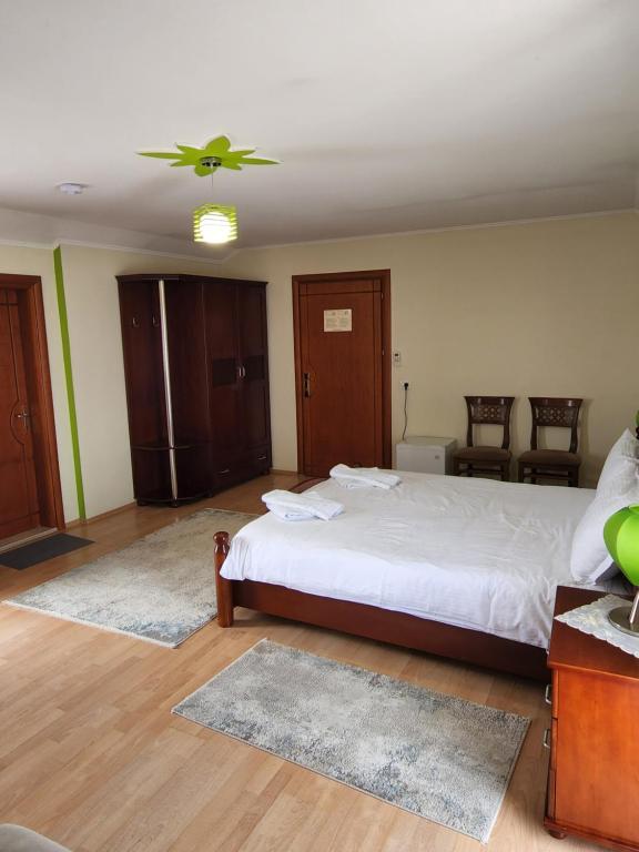 Postel nebo postele na pokoji v ubytování Guesthouse Bimbli