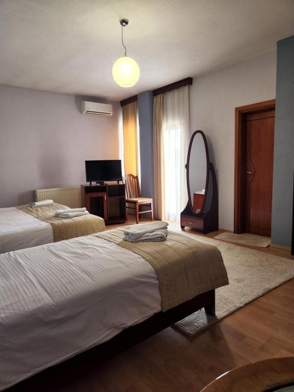 Postel nebo postele na pokoji v ubytování Guesthouse Bimbli