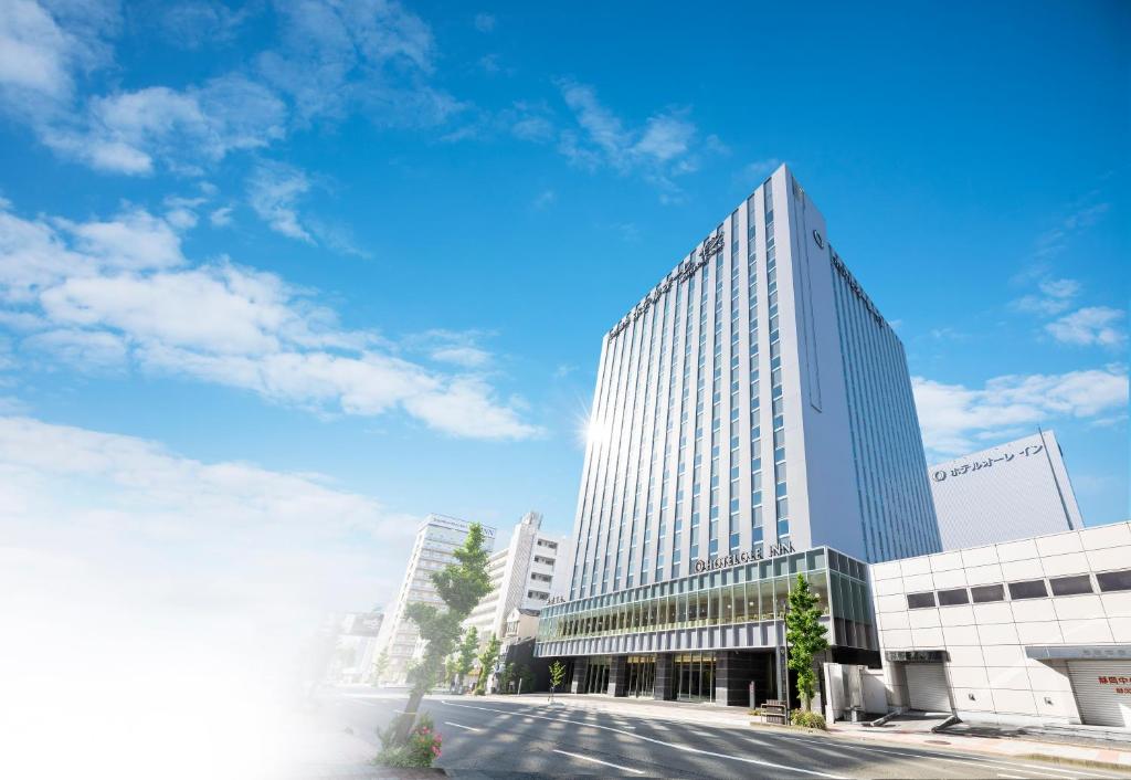 a rendering of a tall office building at HOTEL OLE INN in Shizuoka