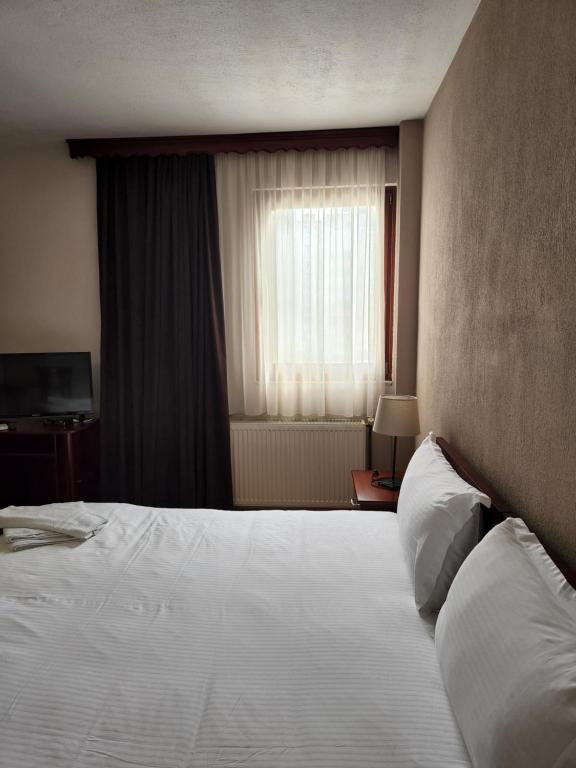 Postel nebo postele na pokoji v ubytování Guesthouse Bimbli