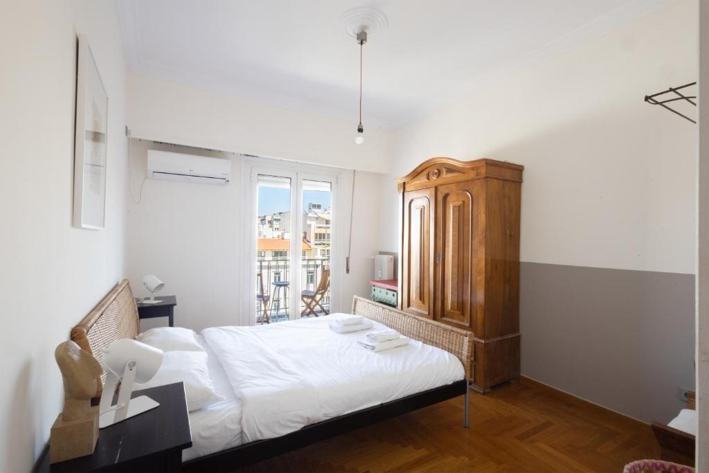 Posteľ alebo postele v izbe v ubytovaní 3 bdr Apt Incredible Acropolis View