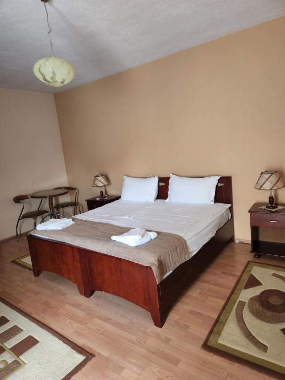 Postel nebo postele na pokoji v ubytování Guesthouse Bimbli