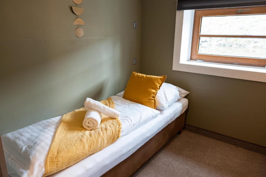 Postel nebo postele na pokoji v ubytování Botel Marina