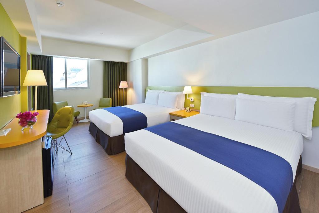 Postel nebo postele na pokoji v ubytování Fullon Poshtel Kenting