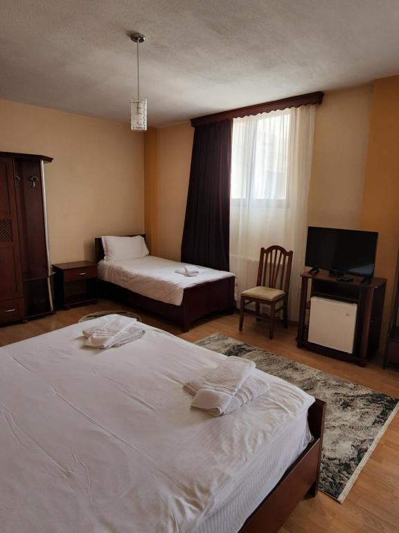Postel nebo postele na pokoji v ubytování Guesthouse Bimbli