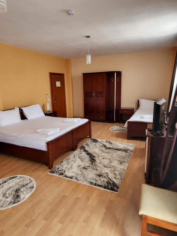 Postel nebo postele na pokoji v ubytování Guesthouse Bimbli