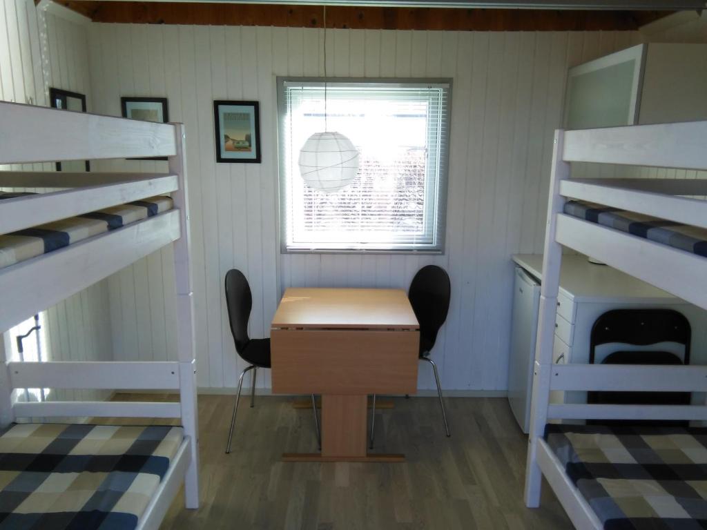Postel nebo postele na pokoji v ubytování Lystskov Camping & Cottages
