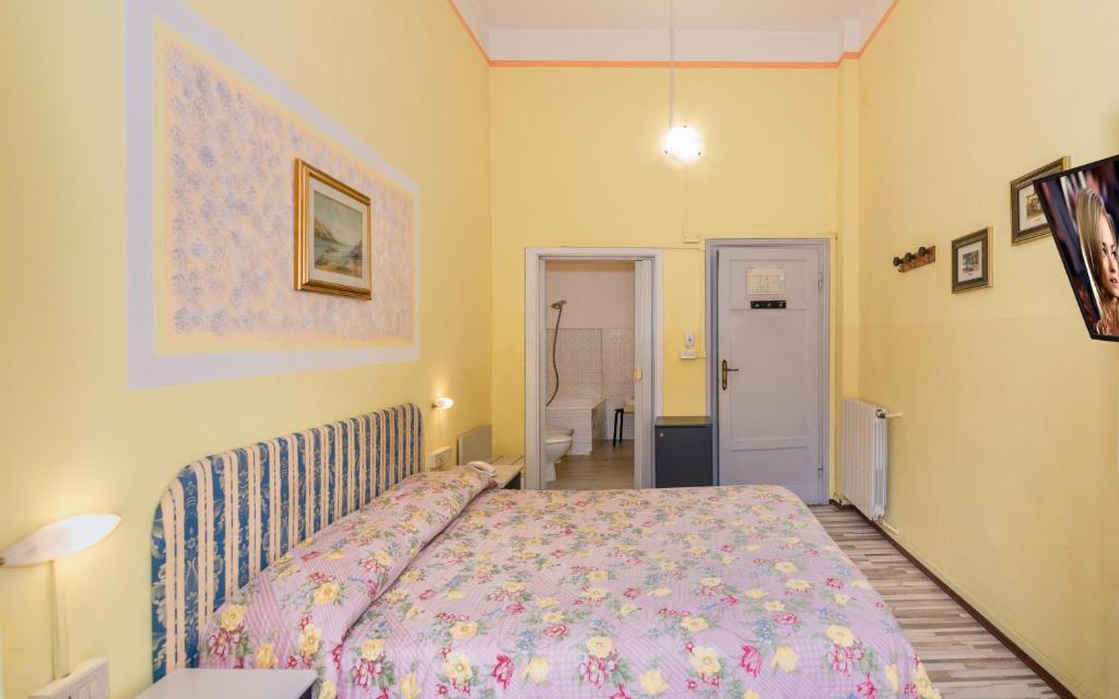 Postel nebo postele na pokoji v ubytování Hotel Stella Del Mare
