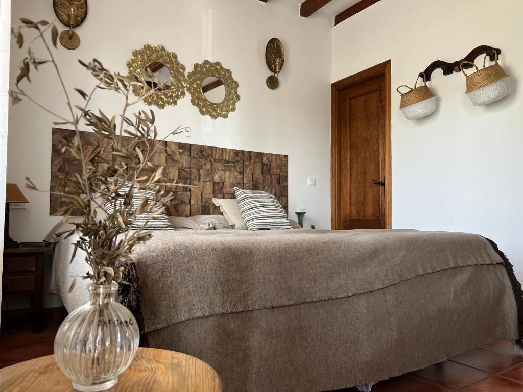Postel nebo postele na pokoji v ubytování Posada La Fontana