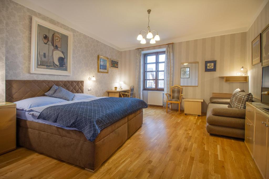 Postel nebo postele na pokoji v ubytování Penzion a restaurace U Míšků