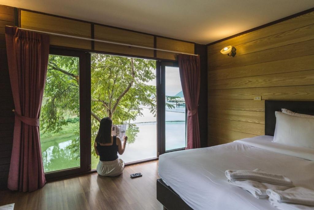 Postel nebo postele na pokoji v ubytování Ruknam Resort