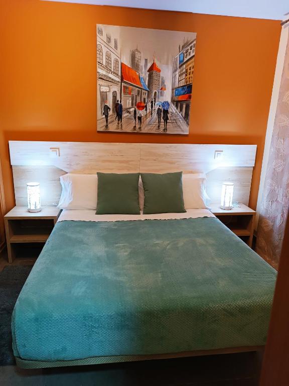 Postel nebo postele na pokoji v ubytování Hotel Alma Rosa