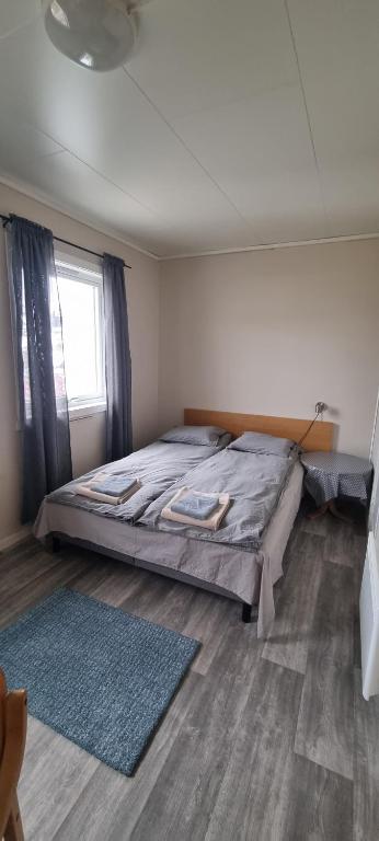 Postel nebo postele na pokoji v ubytování Sleep In