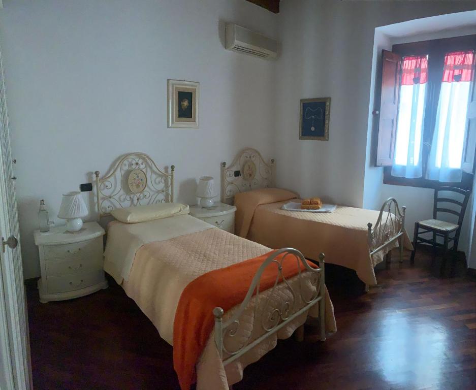 Posteľ alebo postele v izbe v ubytovaní B&B Federica