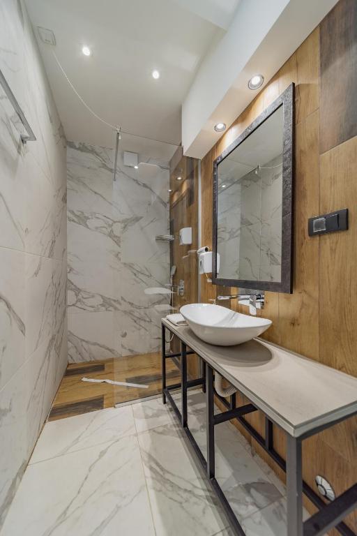Koupelna v ubytování Hotel Garni VIZURA Sport