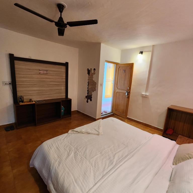 Postel nebo postele na pokoji v ubytování Namlang Resort