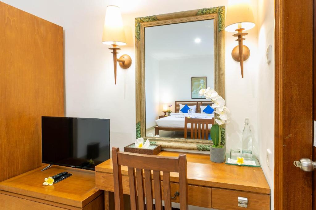 TV a/nebo společenská místnost v ubytování Starloka Saba Bali Hotel