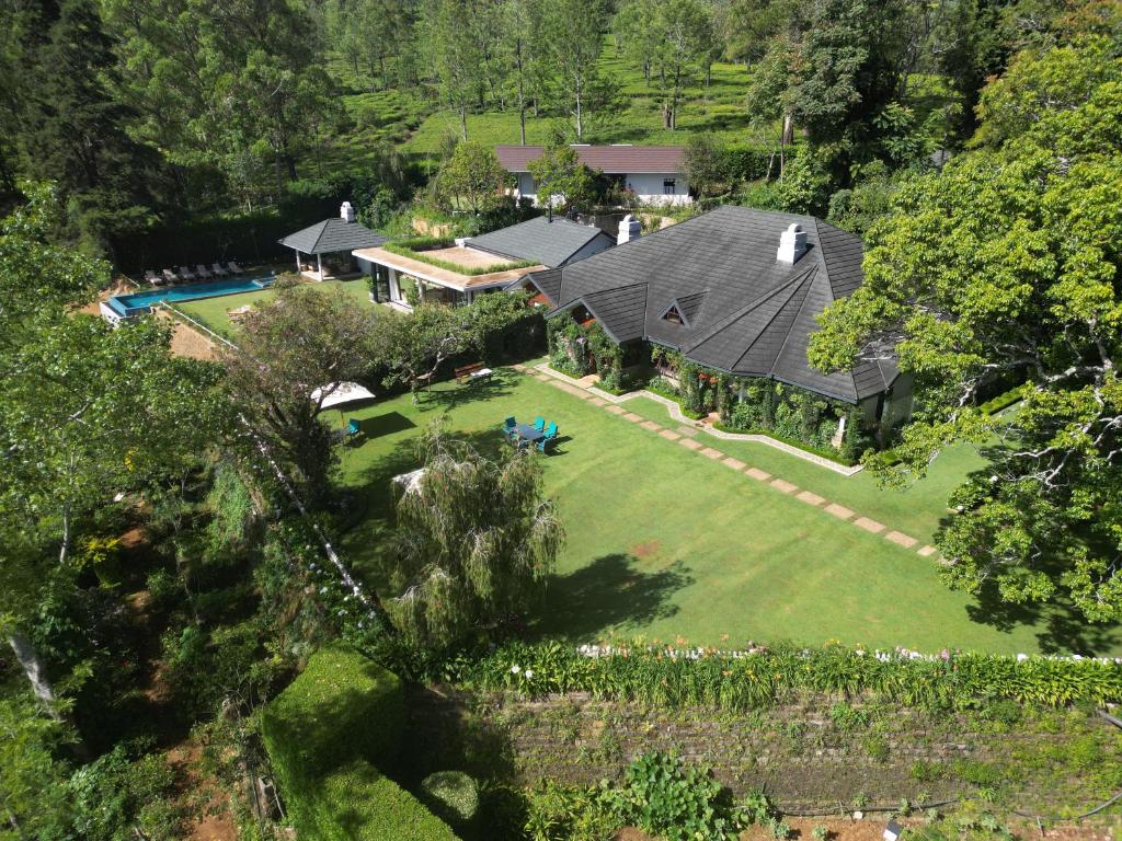 an aerial view of a house with a yard at Stafford Bungalow in Nuwara Eliya