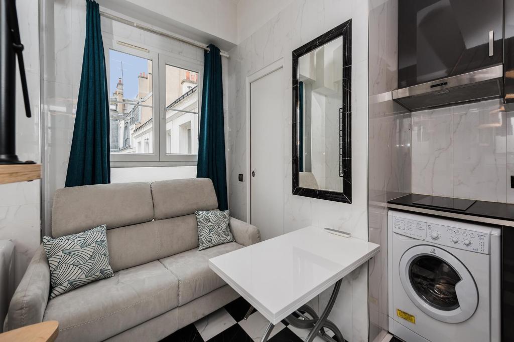 Kuchyňa alebo kuchynka v ubytovaní Charmant studio près des Champs-Élysées