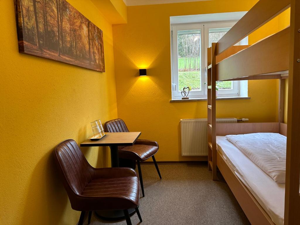 Postel nebo postele na pokoji v ubytování Maiers Hotel