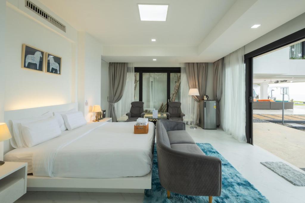 Postel nebo postele na pokoji v ubytování Bluemango Pool Villa & Resort Koh Samui