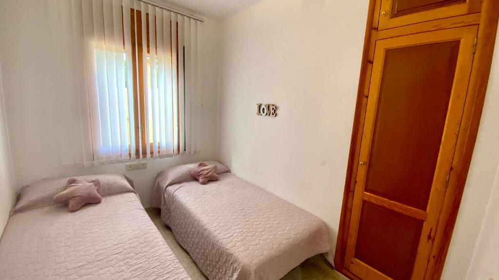 Posteľ alebo postele v izbe v ubytovaní VILLA BONITA