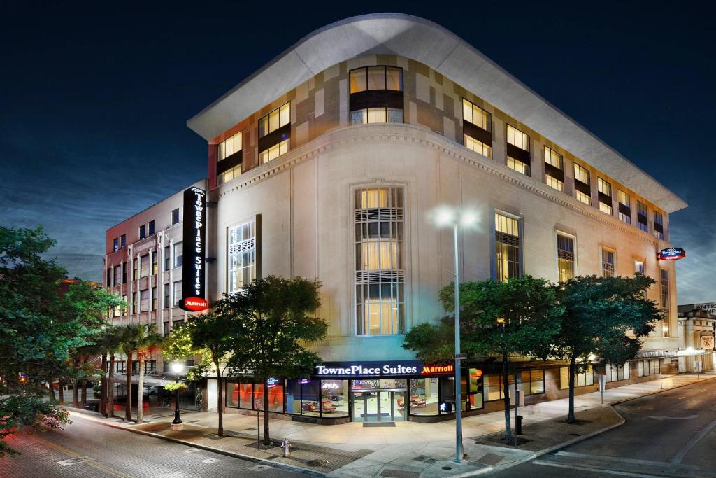 a large building on a city street at night at TownePlace Suites by Marriott San Antonio Downtown Riverwalk in San Antonio