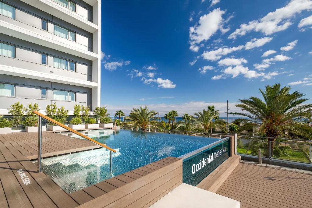 an image of a swimming pool at a hotel at Occidental Atenea Mar - Adults Only in Barcelona