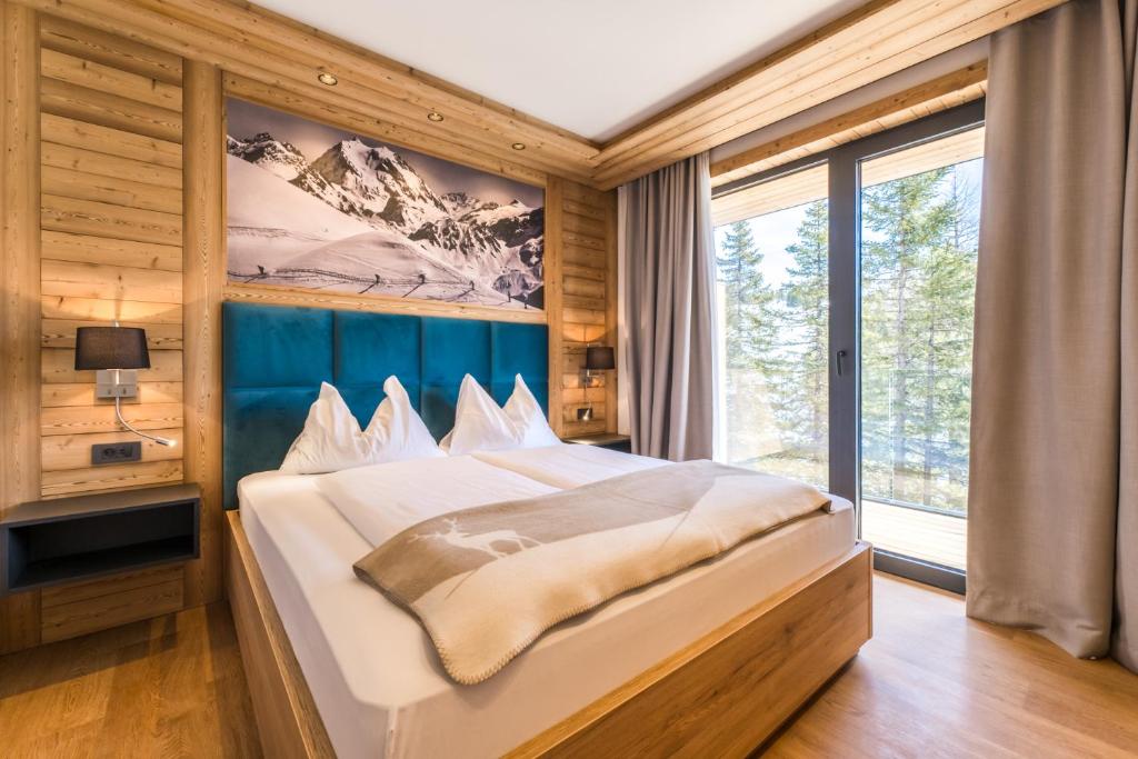 Postel nebo postele na pokoji v ubytování Alpin Peaks