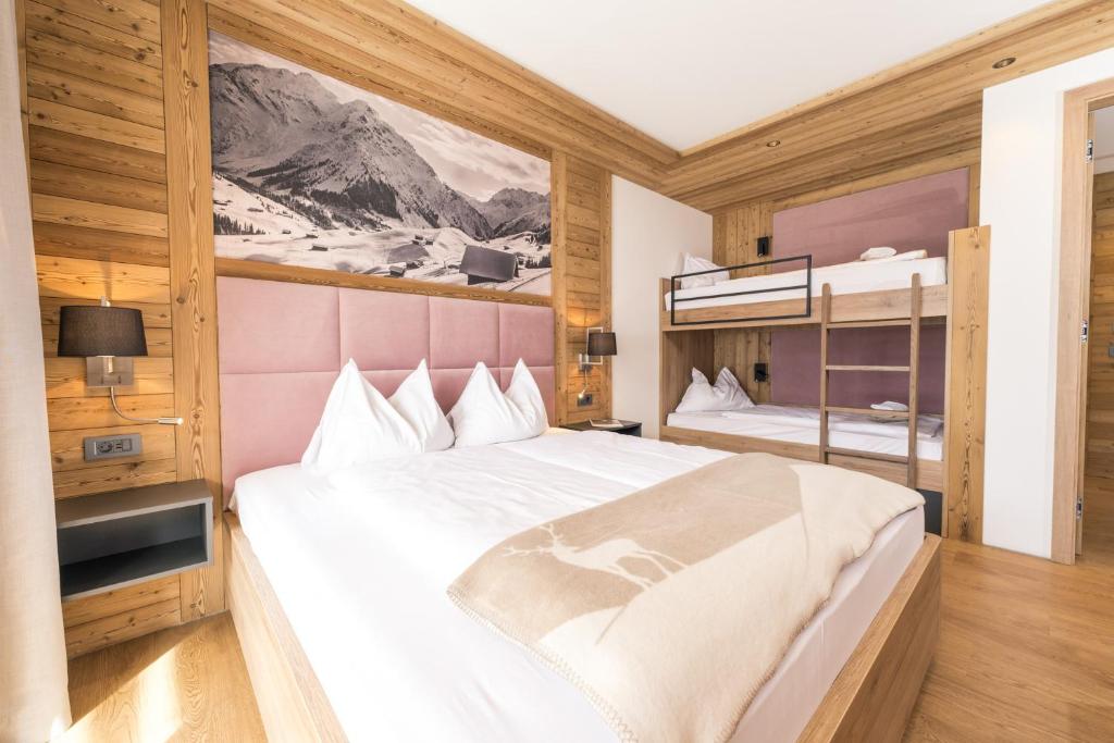 Postel nebo postele na pokoji v ubytování Alpin Peaks