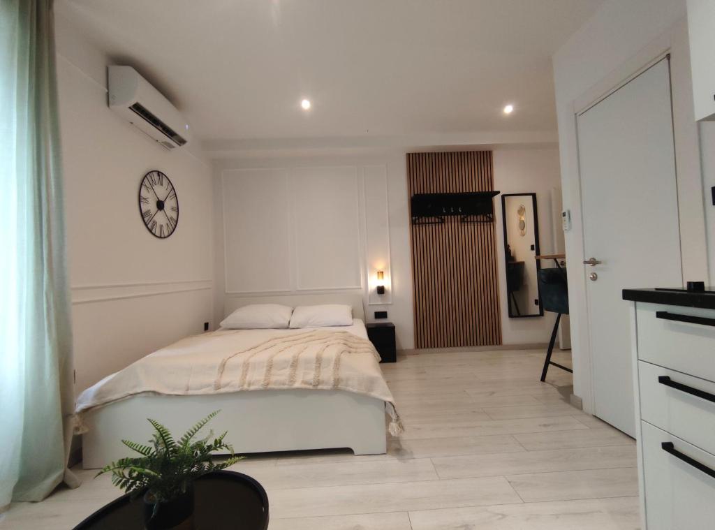 Posteľ alebo postele v izbe v ubytovaní Alegra Apartments Center