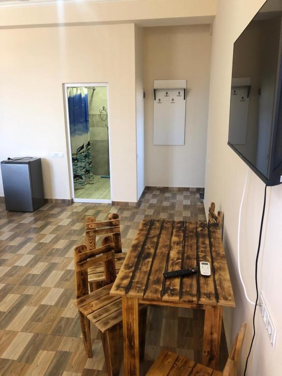 TV a/nebo společenská místnost v ubytování Nigatun Hotel