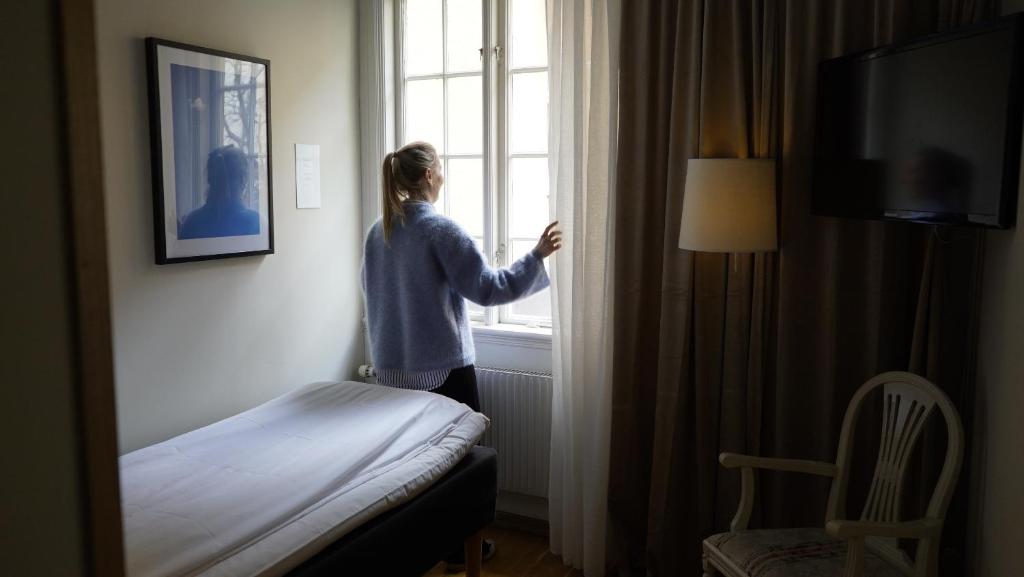 Postel nebo postele na pokoji v ubytování Hotell Hilda