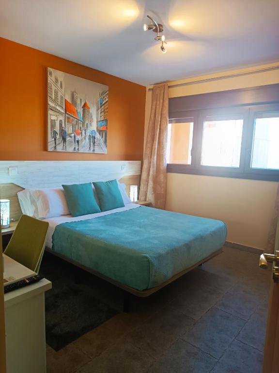 Postel nebo postele na pokoji v ubytování Hotel Alma Rosa