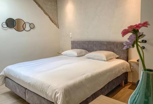 Postel nebo postele na pokoji v ubytování B&B elzartwinning