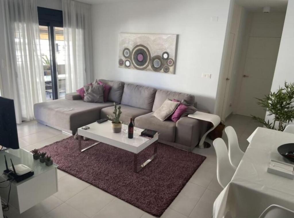 Posezení v ubytování Modern apartment 250m from the sea with parking space behind gate