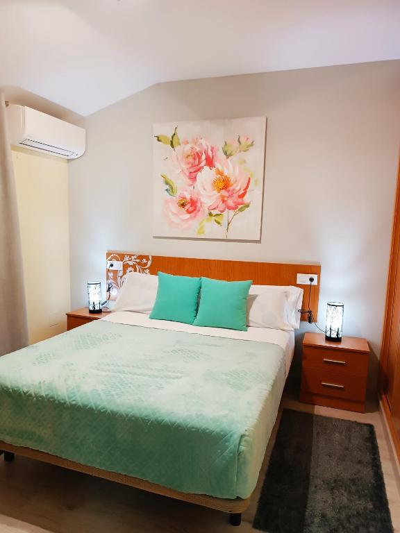 Postel nebo postele na pokoji v ubytování Hotel Alma Rosa