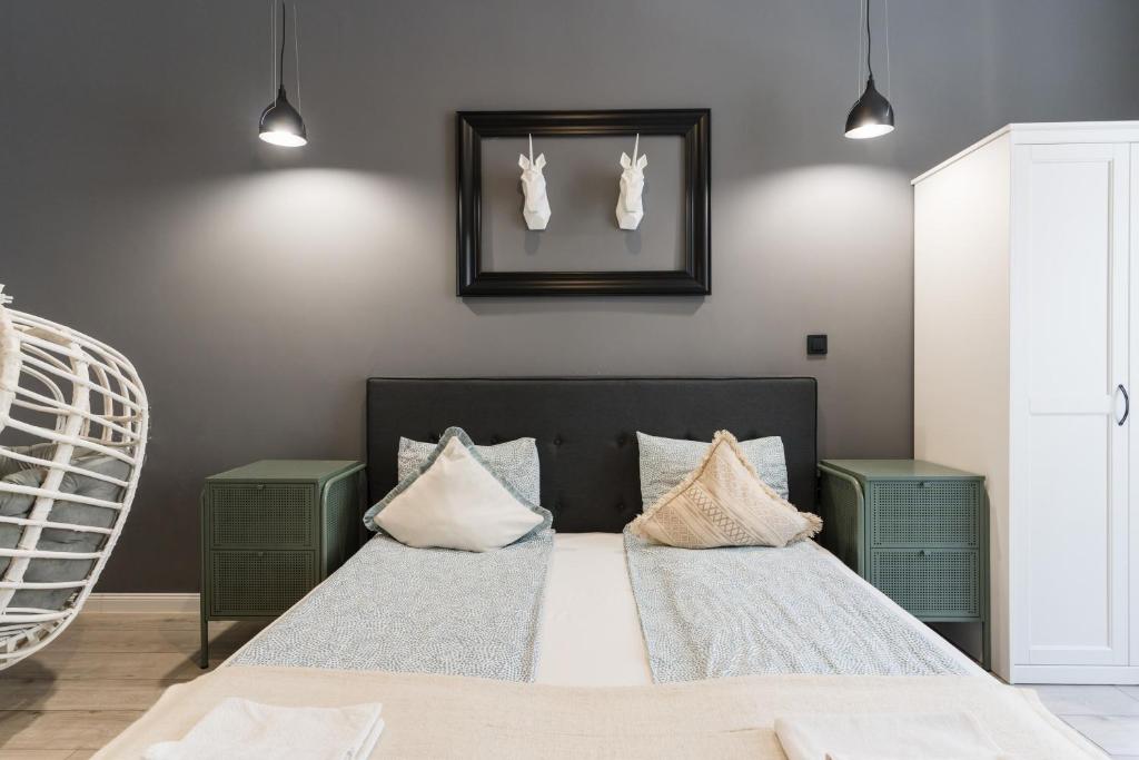 Posteľ alebo postele v izbe v ubytovaní Trendy Design Apartment