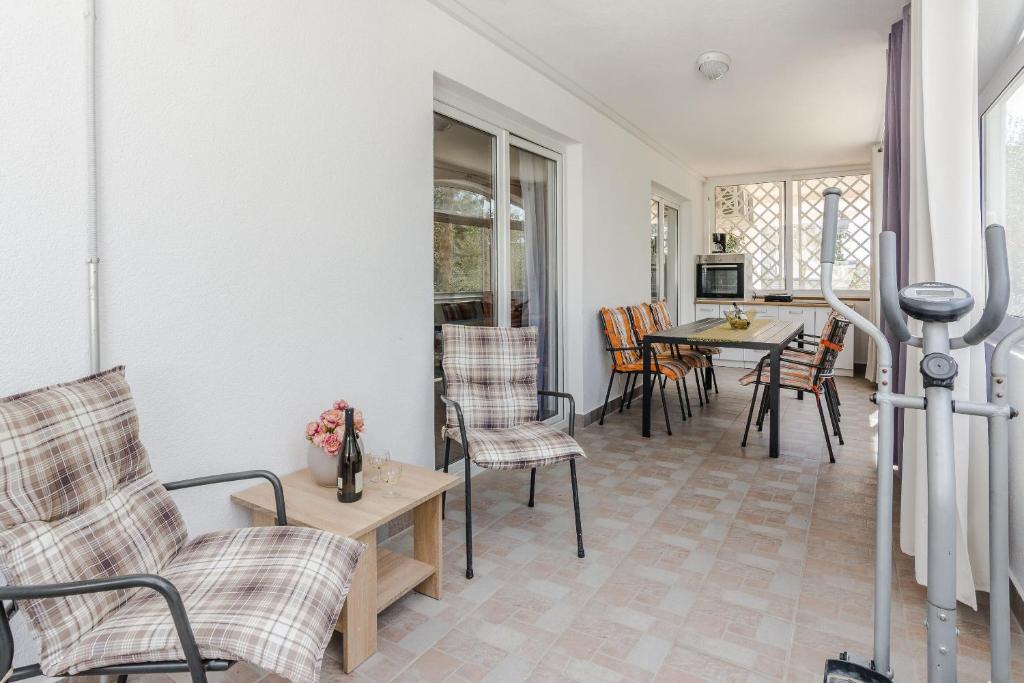 Posedenie v ubytovaní Apartments Jagunic