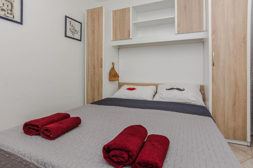 Posteľ alebo postele v izbe v ubytovaní Apartments Jagunic