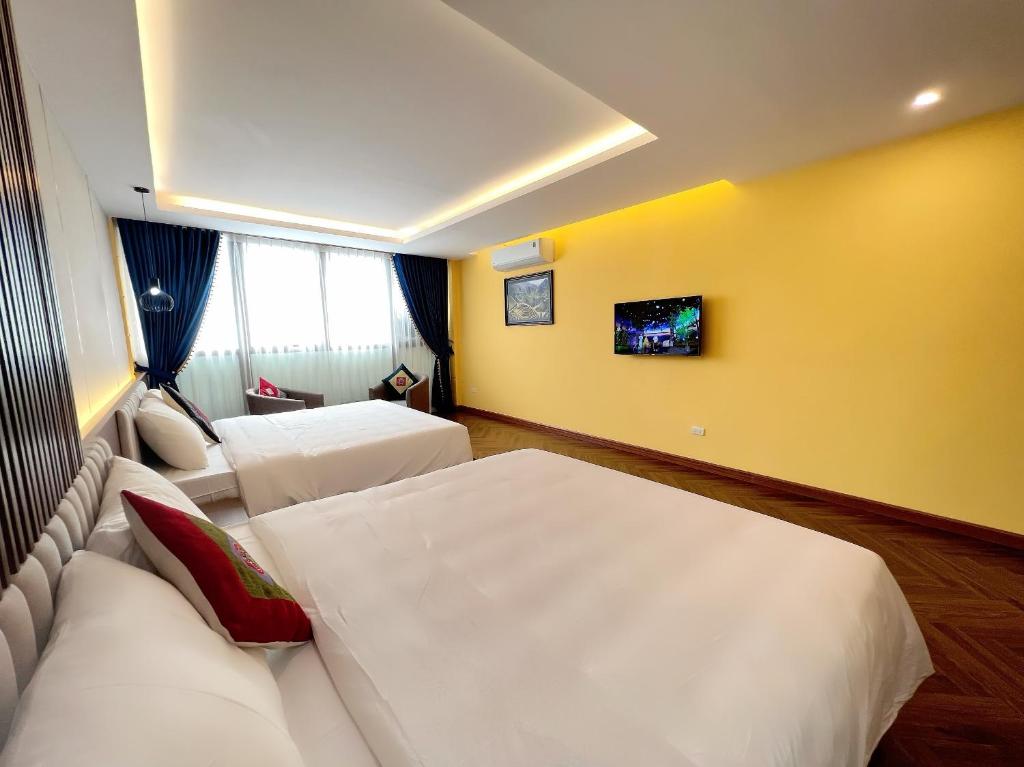 Postel nebo postele na pokoji v ubytování An Khang Hotel Sapa