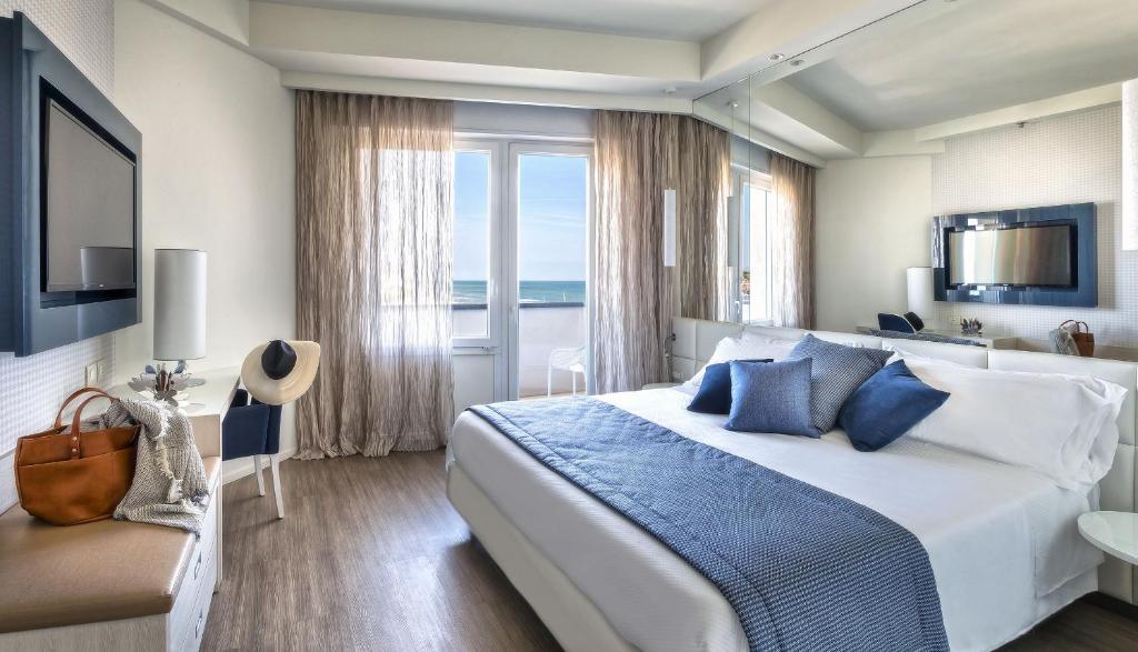 TV a/nebo společenská místnost v ubytování Hotel Nautico