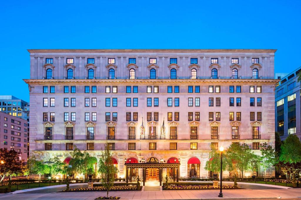 a large building in a city at night at The St. Regis Washington, D.C. in Washington, D.C.