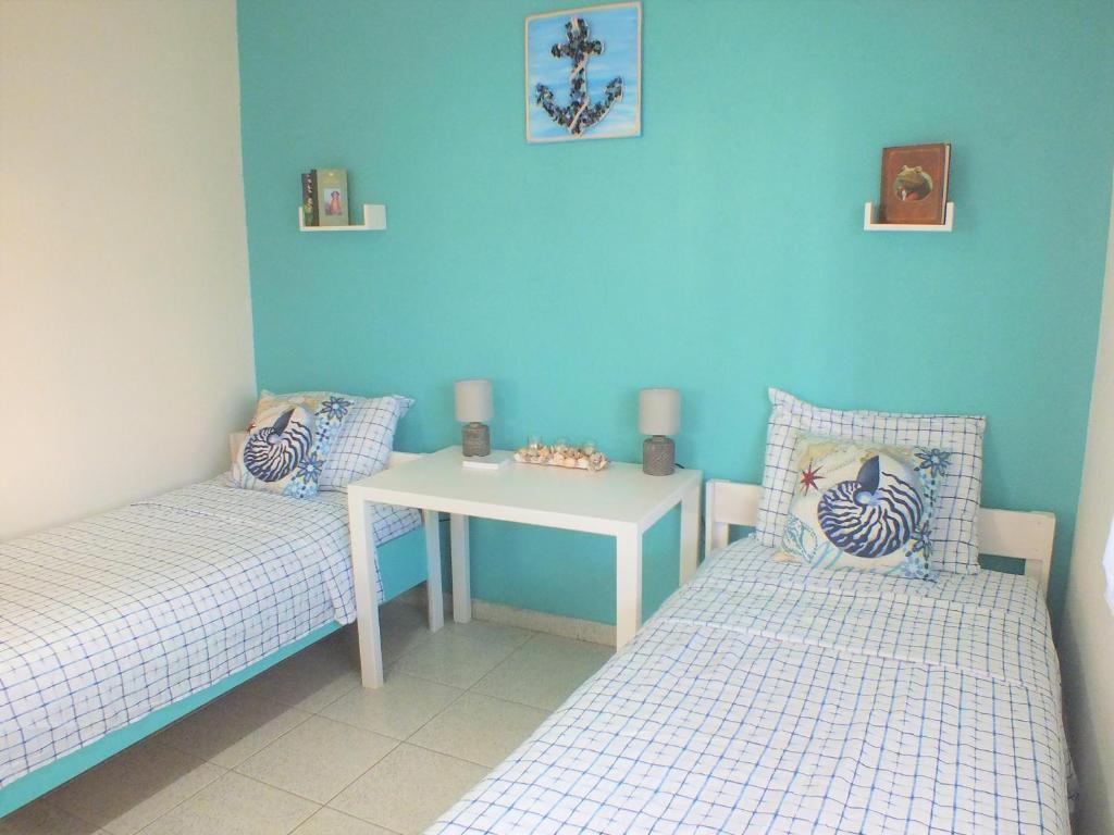 A bed or beds in a room at Asprovalta Family Villas