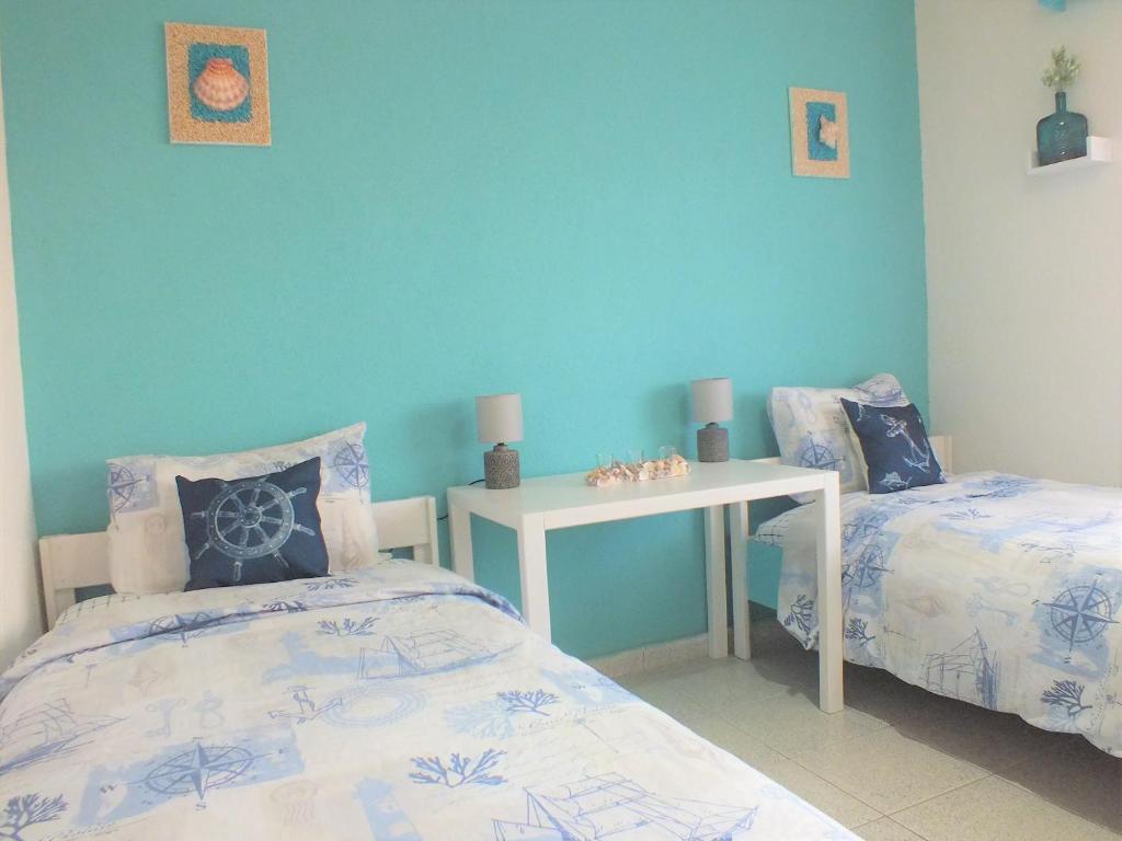 A bed or beds in a room at Asprovalta Family Villas