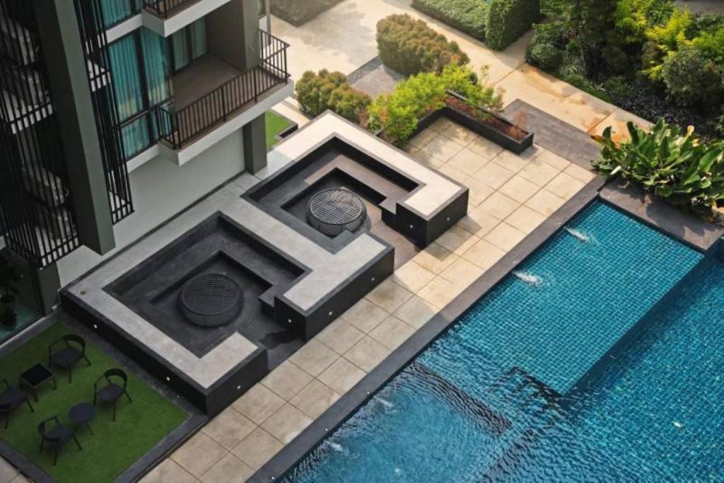 Bazén v ubytování Execlusive Suite 209 by Forest Khaoyai nebo v jeho okolí