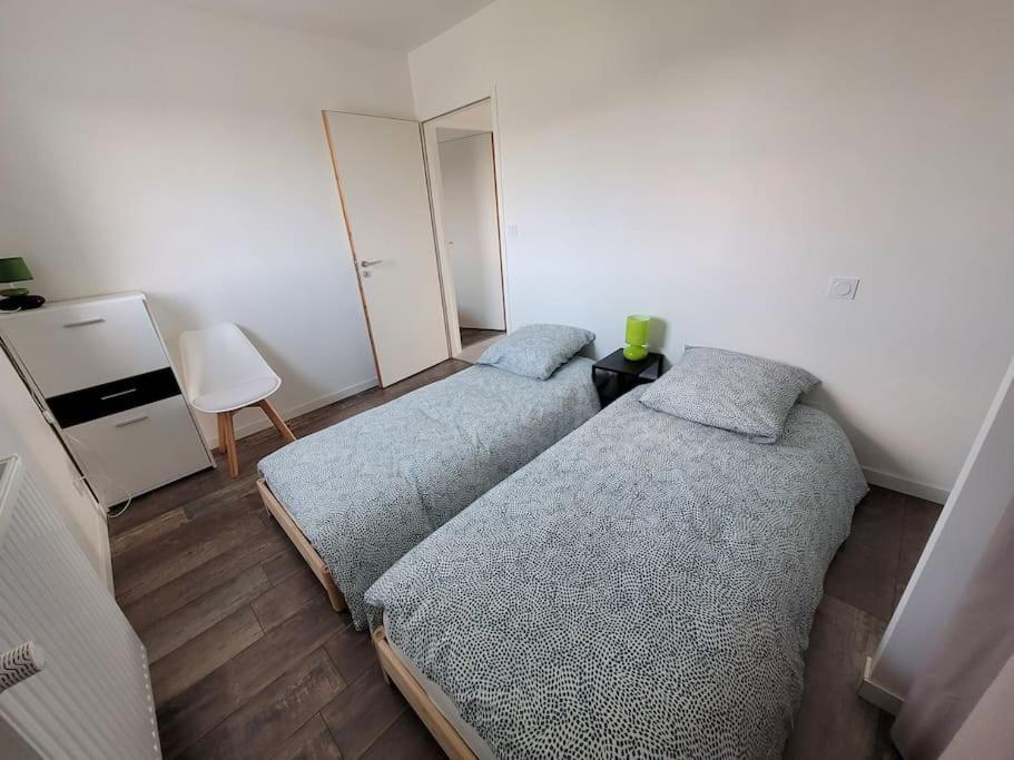 Posteľ alebo postele v izbe v ubytovaní Chez Nana