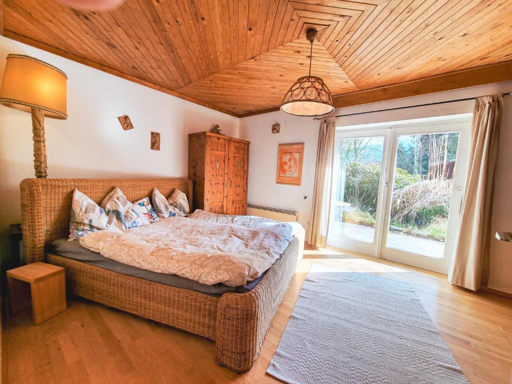 Posteľ alebo postele v izbe v ubytovaní Ruhige Wohnung mit schönem Eigengarten in Seeboden am Millstättersee